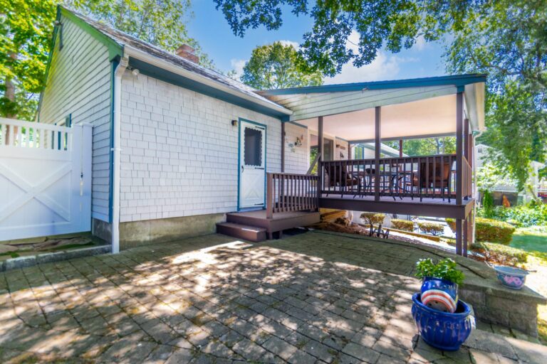 a deck with metal furnitures