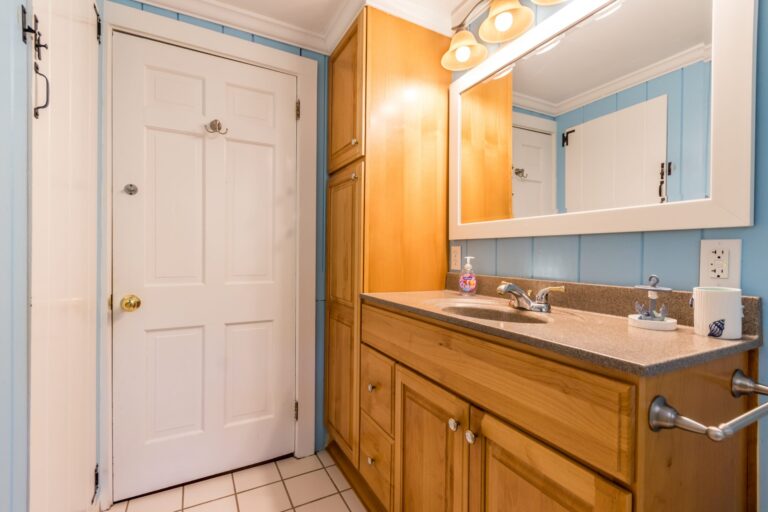 a bathroom with toilet, tub, and lavatory