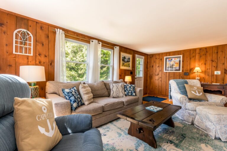 a living room with couch and table