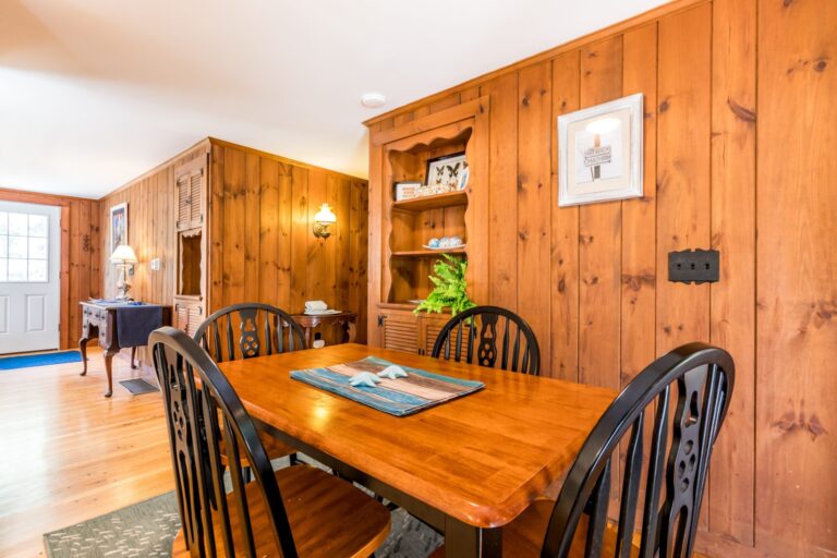 wooden dining table with chairs
