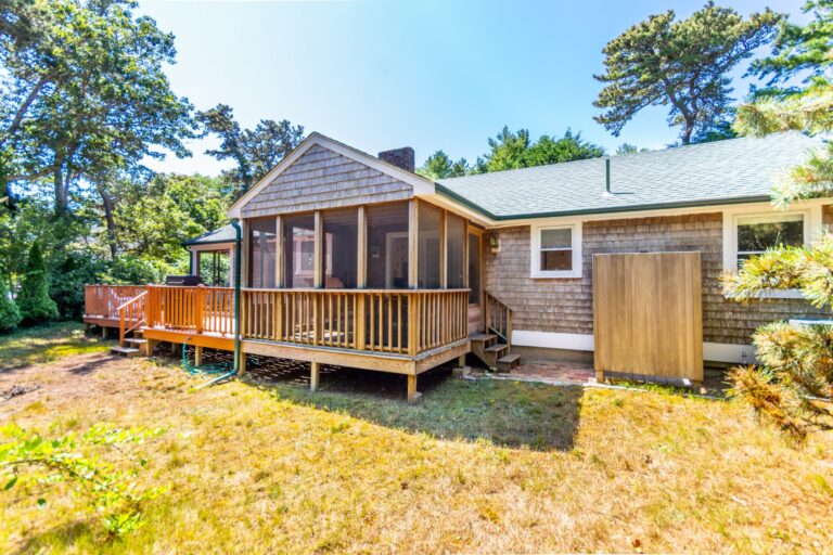 the back entrance of a wooden house in 65 Lantern Ln, South Chatham