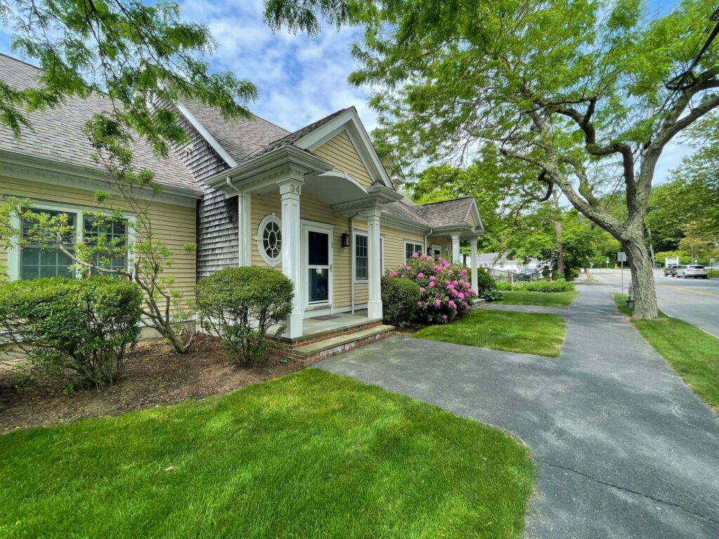 a house with a driveway in front of it